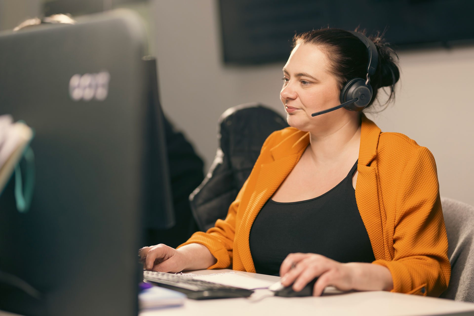 Woman on the phone to a supplier