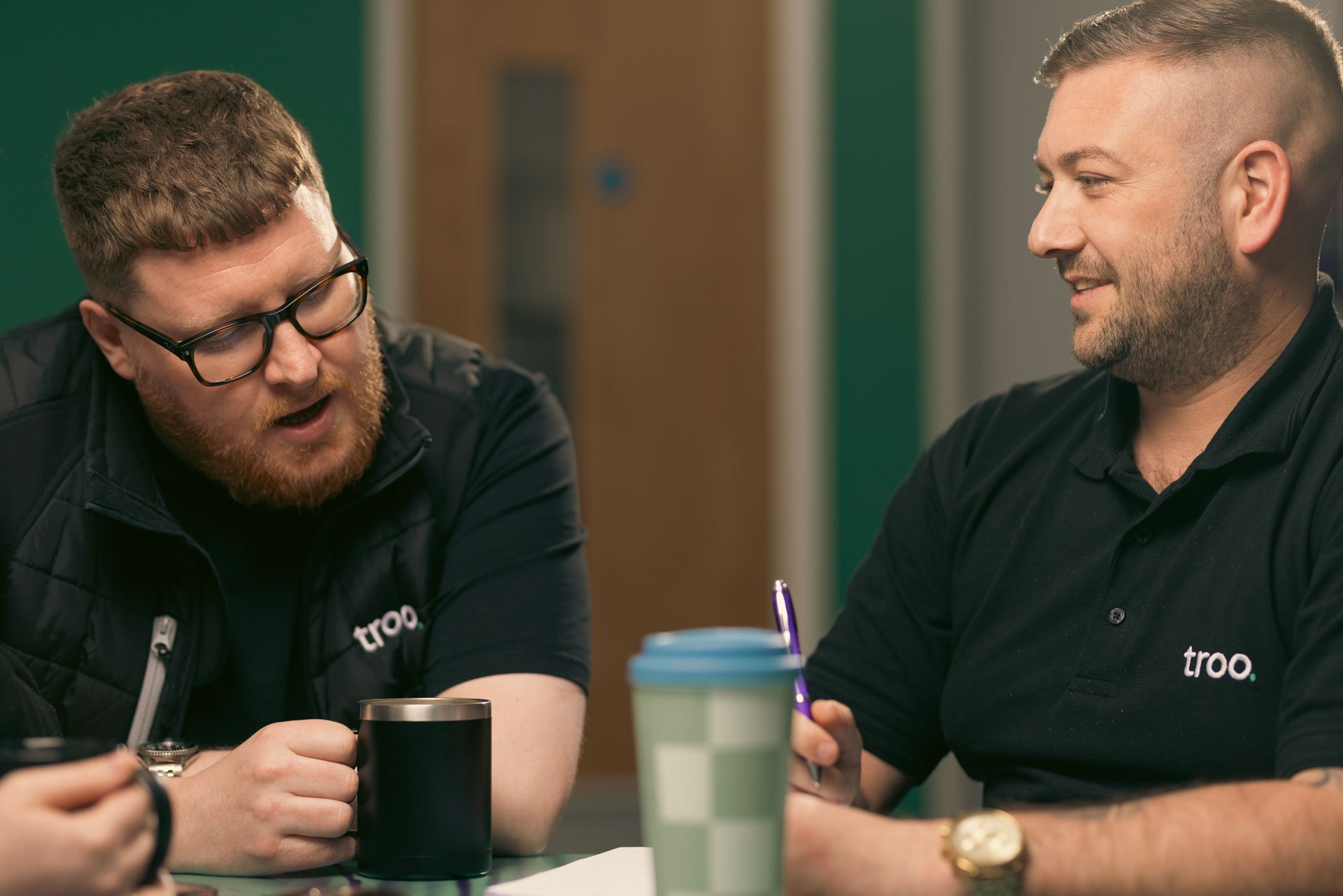 Troo team members talking to each other
