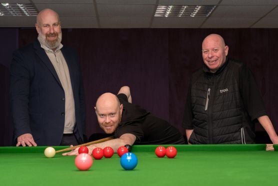 Troo team members with snooker champion Gary Wilson